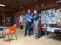 Chipstead SC Radio Sailing IOM Unicorn Trophy: Dave Allinson presenting presenting 3rd placed David Lindsay with his prize © Stuart Ord-Hume