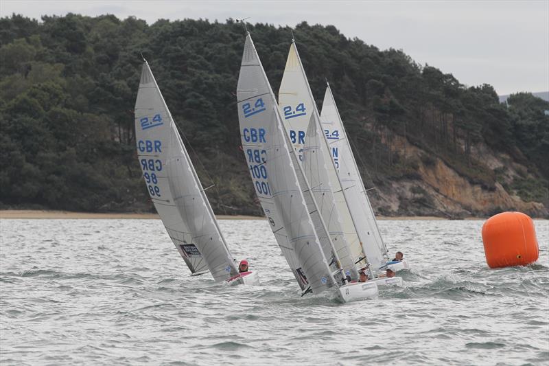 The British Sailing Team's Helena Lucas (GBR100) and Megan Pascoe (GBR98) won silver and bronze respectively in the 2013 International 2.4mR World Championships at Poole Yacht Club photo copyright Peter Newton taken at Poole Yacht Club and featuring the 2.4m class