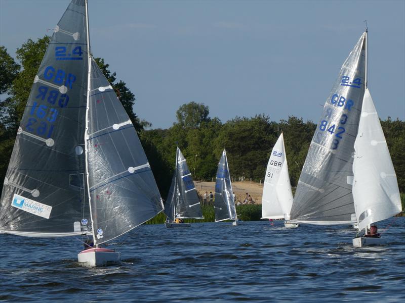 Close racing during the Frensham Pond 2.4mR Open photo copyright Ivor Barrett taken at Frensham Pond Sailing Club and featuring the 2.4m class