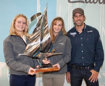 Annabel Vose and Megan Brickwood are presented with the YJA Pantaenius Young Sailor of the Year Award for 2011 by Iain Percy
