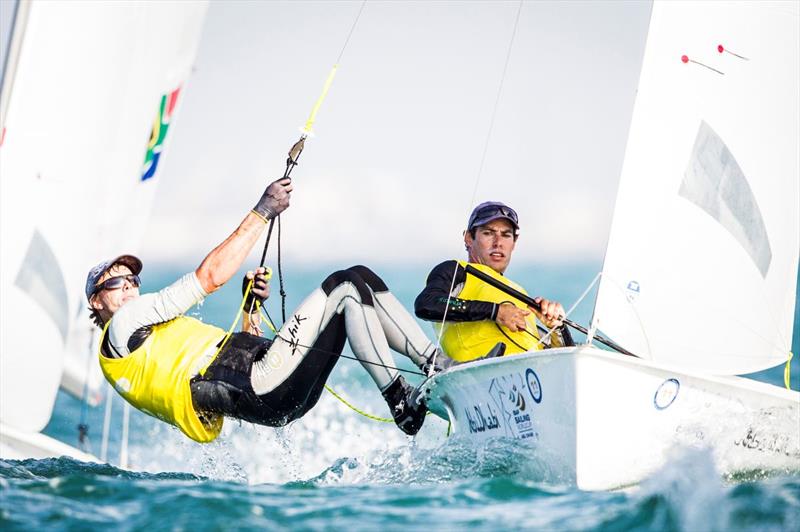 Mat Belcher and Will Ryan on day 2 of the ISAF Sailing World Cup Final in Abu Dhabi photo copyright Pedro Martinez / Sailing Energy / ISAF taken at  and featuring the 470 class