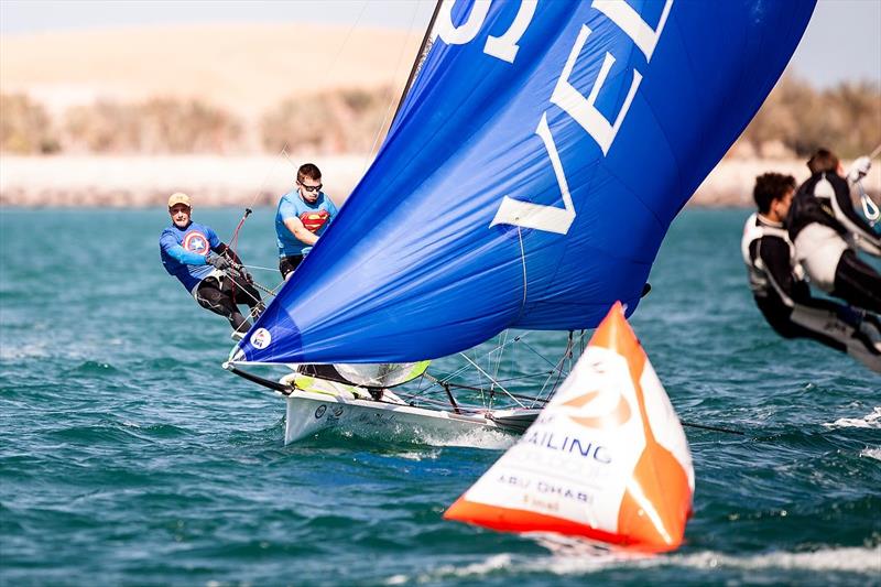 Captain America and Superman on day 1 of the ISAF Sailing World Cup Final in Abu Dhabi photo copyright Barbara Sanchez / Sailing Energy / ISAF taken at  and featuring the 49er class