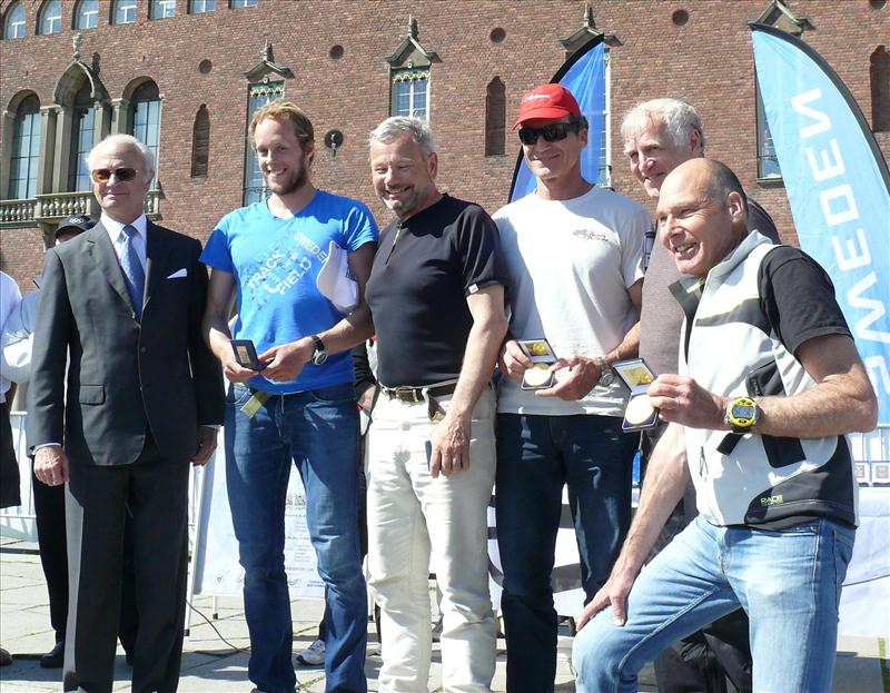 Paul Cayard (4th from left) and his team receive their gold medals for winning the final day’s Olympic Invitational Regatta from King Carl XVI Gustaf (left) at the Swedish Olympic Centenary Regatta photo copyright Philip Crebbin taken at  and featuring the 6m class
