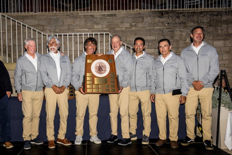 2023 Six Metre World Championship Prize Giving - His Majesty King Juan Carlos of Spain and the Bribon crew with the Djinn Trophy for the Classic World Championship photo copyright SailingShots by Maria Muiña taken at Royal Yacht Squadron and featuring the 6m class