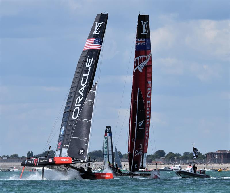 A close call between ORACLE TEAM USA and Emirates Team New Zealand at America's Cup World Series Portsmouth photo copyright Keith Turner taken at  and featuring the AC45 class