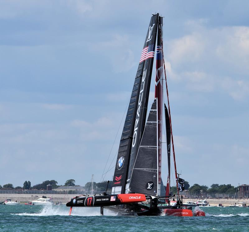 A close call between ORACLE TEAM USA and Emirates Team New Zealand at America's Cup World Series Portsmouth - photo © Keith Turner