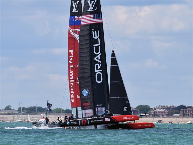 A close call between ORACLE TEAM USA and Emirates Team New Zealand at America's Cup World Series Portsmouth photo copyright Keith Turner taken at  and featuring the AC45 class
