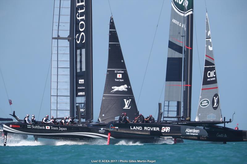 SoftBank Team Japan and Land Rover BAR collide on the opening day of the 35th America's Cup photo copyright ACEA 2017 / Gilles Martin-Raget taken at  and featuring the AC50 class