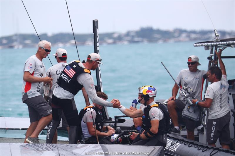 A much happier ORACLE TEAM USA after their race win on day 3 of the 35th America's Cup Match photo copyright ACEA 2017 / Gilles Martin-Raget taken at  and featuring the AC50 class