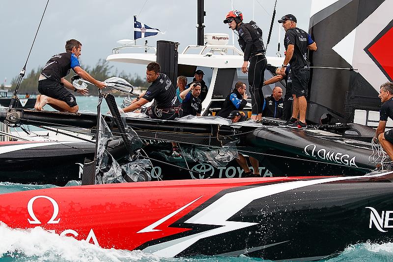 Inspecting the extent of damage - Emirates Team New Zealand's nosedive - June 6, 2018. Semi-Final 4, America's Cup Playoffs photo copyright Richard Hodder taken at  and featuring the AC50 class