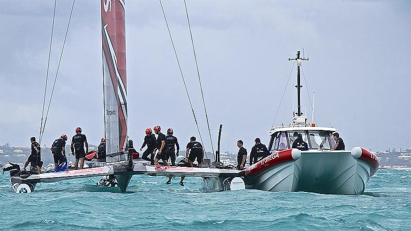 Emirates Team New Zealand - recovery - the chase boat is lashed alongside ready for side-slipping - Race 4 - Semi-Finals, America's Cup Playoffs- Day 11, June 6, 2017 (ADT) photo copyright Richard Gladwell taken at  and featuring the AC50 class