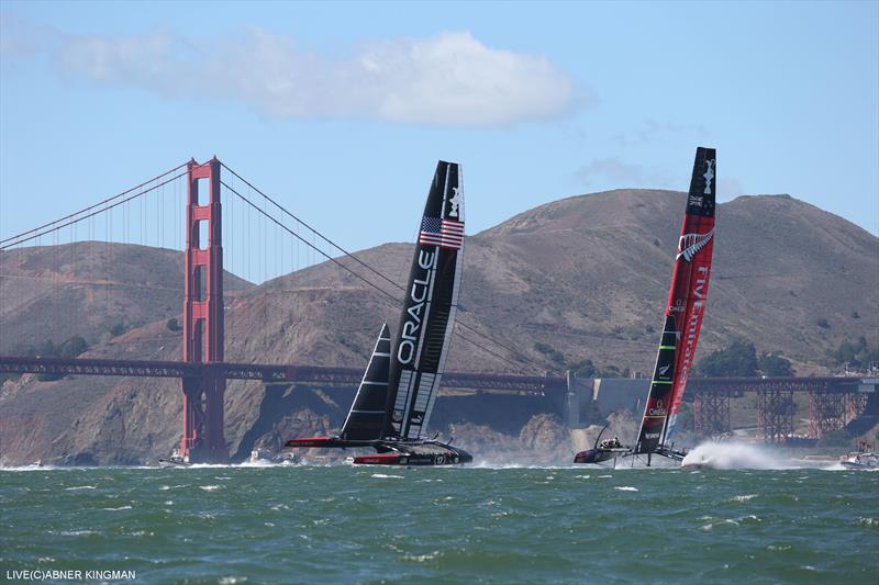 ORACLE TEAM USA and Emirates Team New Zealand round mark 1 during the 34th America's Cup deciding race 19 photo copyright Abner Kingman / ACEA taken at  and featuring the AC72 class