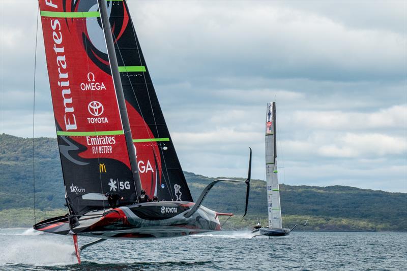 Emirates Team New Zealand and American Magic cross tacks in the Rangitoto Channel - photo © Emirates Team New Zealand