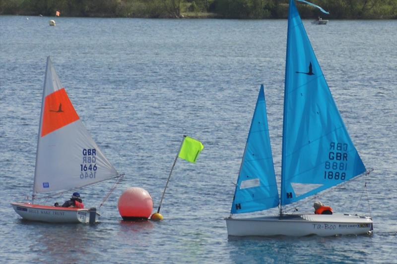 A 2.3 and a Liberty at the windward mark of the Burghfield Hansa Dinghy Open photo copyright Ron Sawford taken at Burghfield Sailing Club and featuring the Hansa class