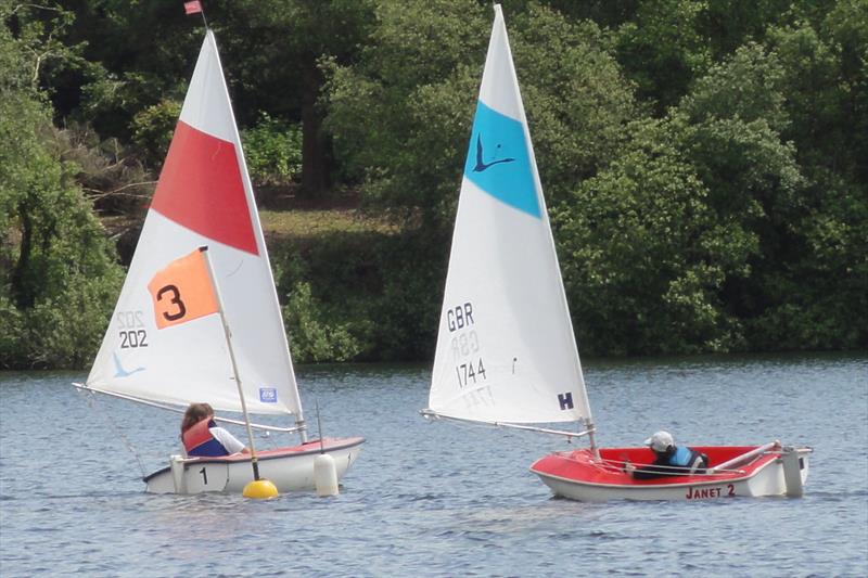 Close racing in the Hansa 2.3 Class during the New Forest and District Sailability Hansa TT photo copyright Ron Sawford taken at  and featuring the Hansa class