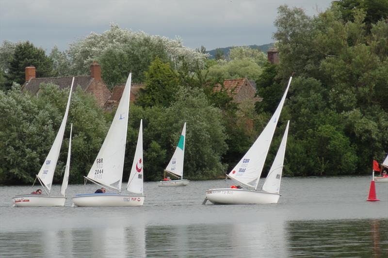 Access Libertys in close combat during the TT at Frampton on Severn photo copyright Ron Sawford taken at Frampton on Severn Sailing Club and featuring the Hansa class