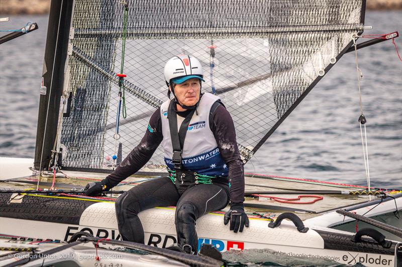 Aussie National Champion, Stevie Brewin is no stranger to World podiums having been champion in 2017 at Sopot photo copyright Gordon Upton / www.guppypix.com taken at Houston Yacht Club and featuring the A Class Catamaran class