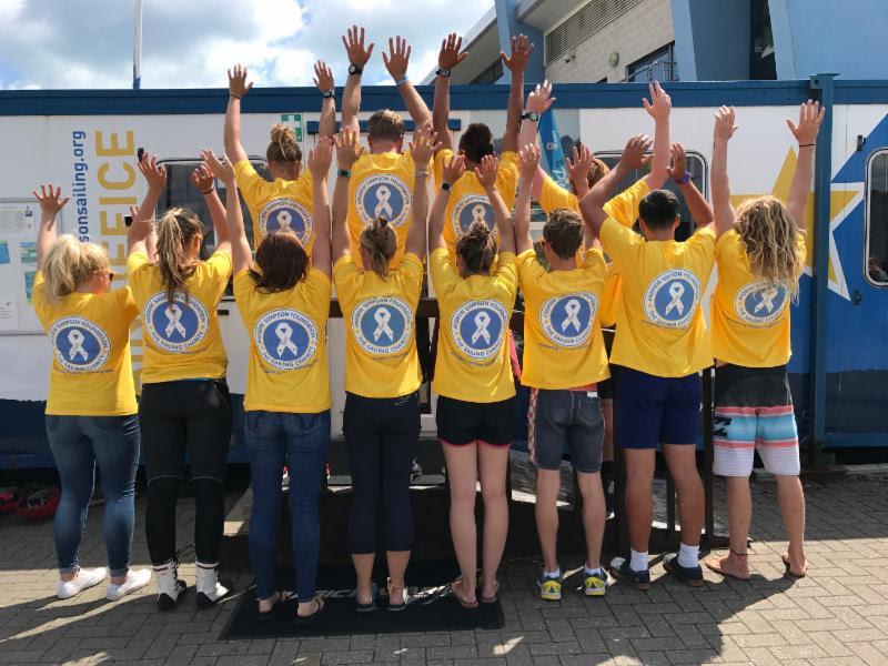 Volunteers reveal the new-look branding now adopted by the Andrew Simpson Foundation to tie in with a host of new charitable activities to be announced photo copyright ASF taken at Andrew Simpson Sailing Centre and featuring the  class