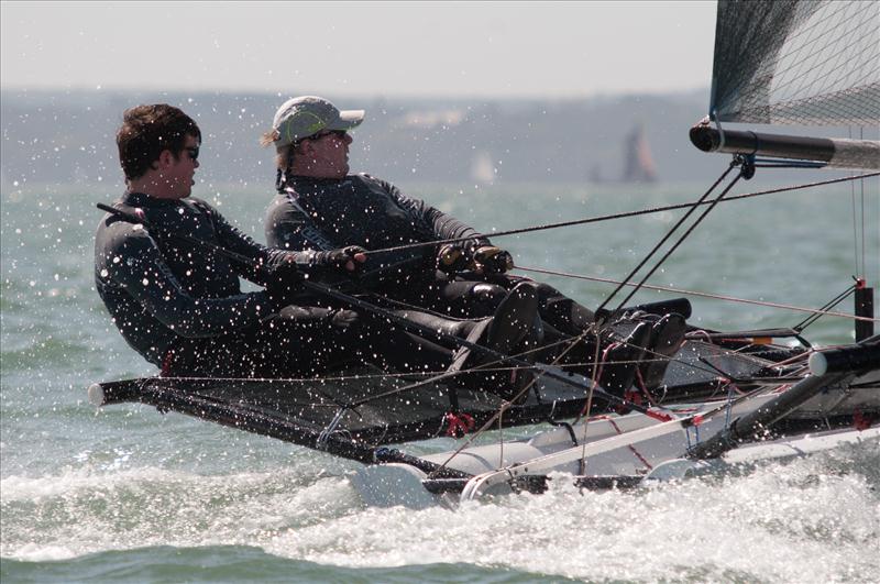 The B14s and Musto Skiffs enjoy the sunshine at Stokes Bay