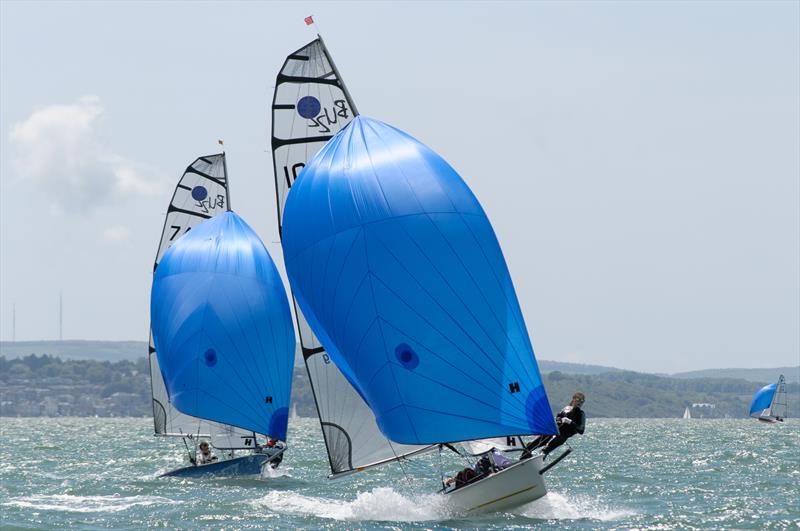 Chris & Ellen Flewitt in Buzz 1000 lead eventual winners Matt Butler & Frankie Cook in 748 during the Buzz Nationals at Warsash photo copyright Iain McLuckie taken at Warsash Sailing Club and featuring the Buzz class