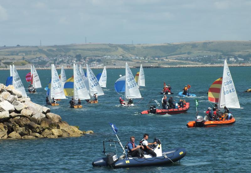 Launching on day 1 of the Cadet Nationals at the WPNSA photo copyright Peter Collyer taken at Weymouth & Portland Sailing Academy and featuring the Cadet class