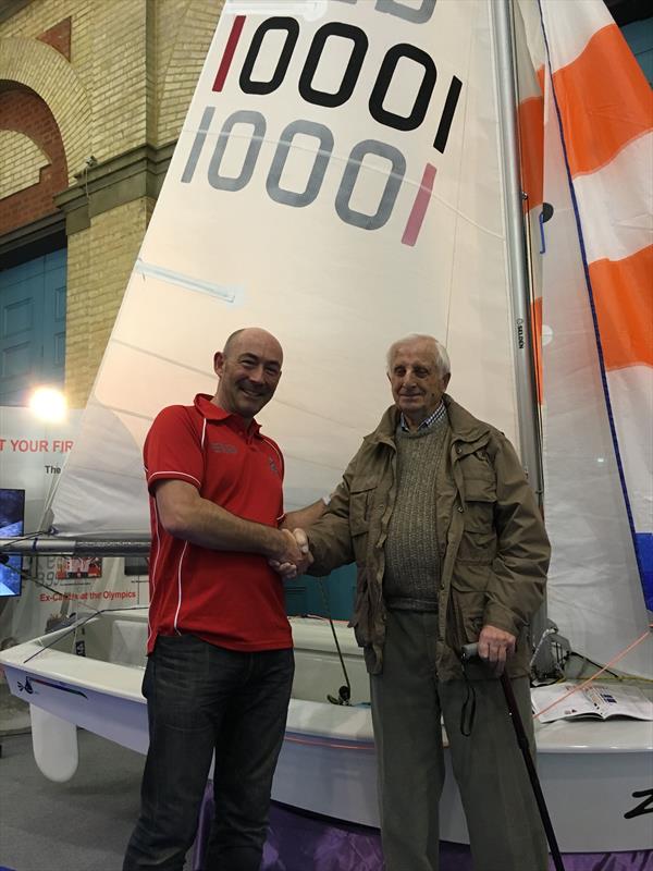 Roy Jarred with Cadet 10001 at the RYA Suzuki Dinghy Show photo copyright Ian Harris taken at RYA Dinghy Show and featuring the Cadet class