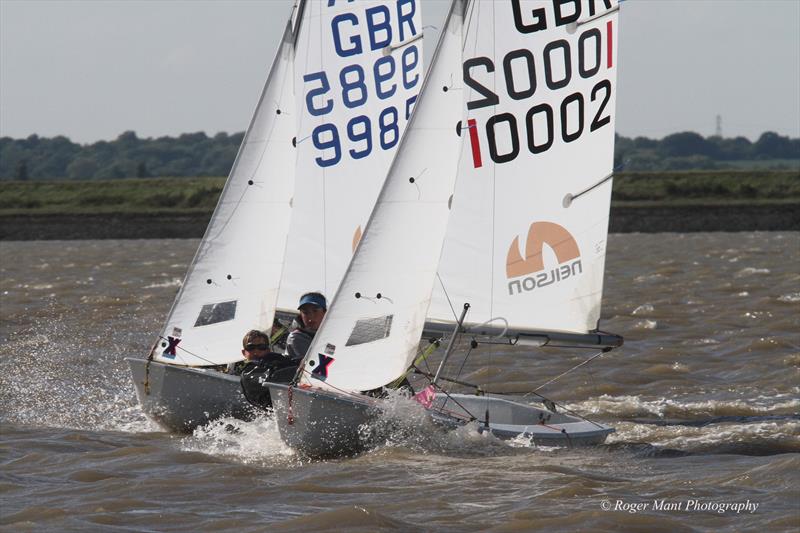 Megan Fergusson and Ollie Mears battling for line honours with Bettine Harris and Sam Goult during the Burnham on Crouch Cadet selector photo copyright Roger Mant Photography taken at Royal Corinthian Yacht Club, Burnham and featuring the Cadet class