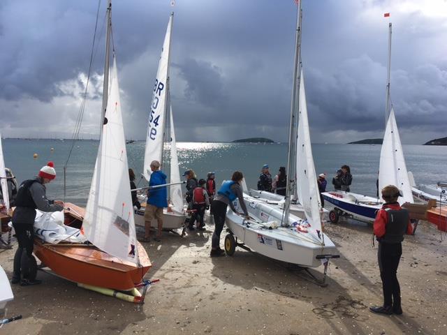 Cadets under darkened skies during the 2017 Nationals in Abersoch photo copyright Jo Harris taken at South Caernarvonshire Yacht Club and featuring the Cadet class