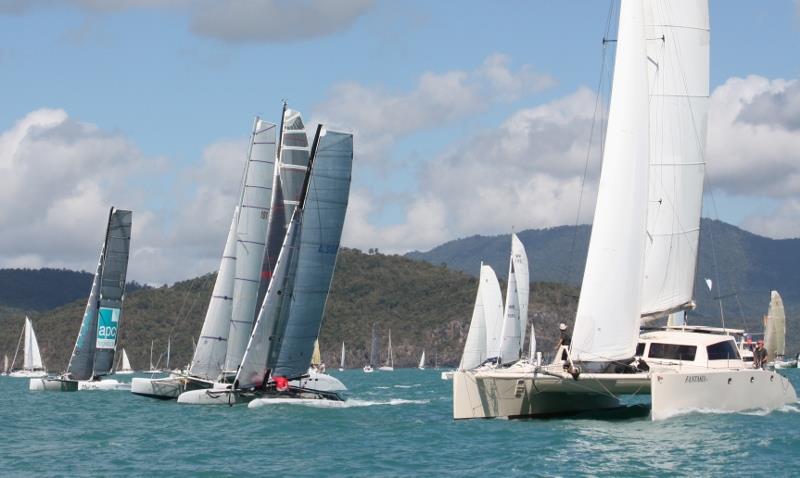 Multihull Racing fleet was led by APC Mad Max from the start line to the finish  on day 3 of Vision Surveys Airlie Beach Race Week photo copyright Tracey Johnstone taken at Whitsunday Sailing Club and featuring the Catamaran class