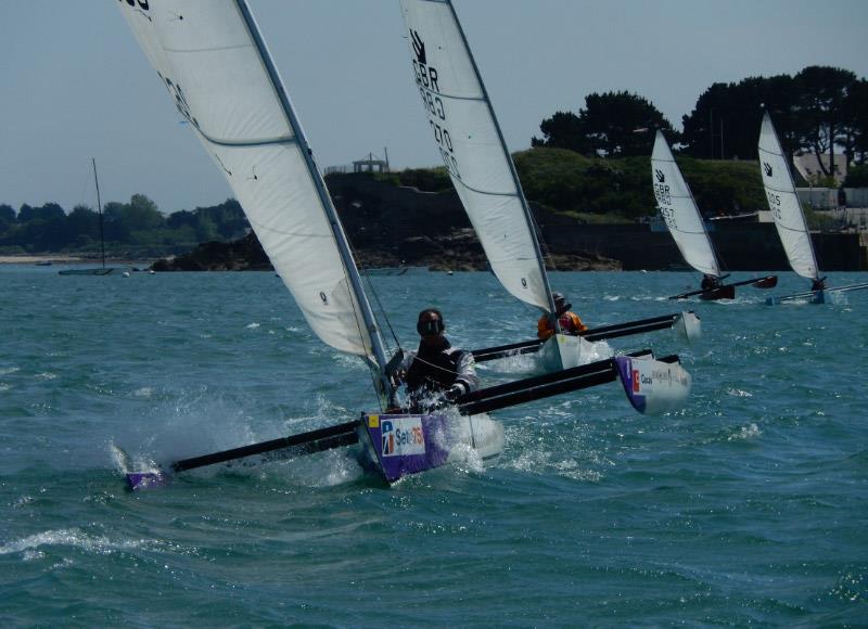 Damien Seguine, French Paralympic medallist and World Champion, leads the fleet during the Challenger event in Quiberon photo copyright Richard Johnson taken at  and featuring the Challenger class