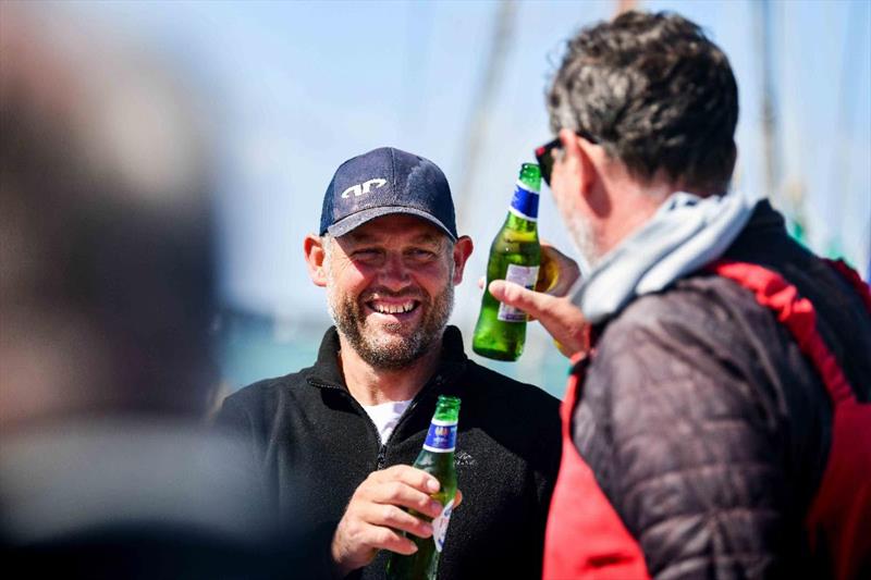 James McHugh and Brian Thompson enjoy a cold beer after completing the race photo copyright James Tomlinson / RORC taken at Royal Ocean Racing Club and featuring the Class 40 class