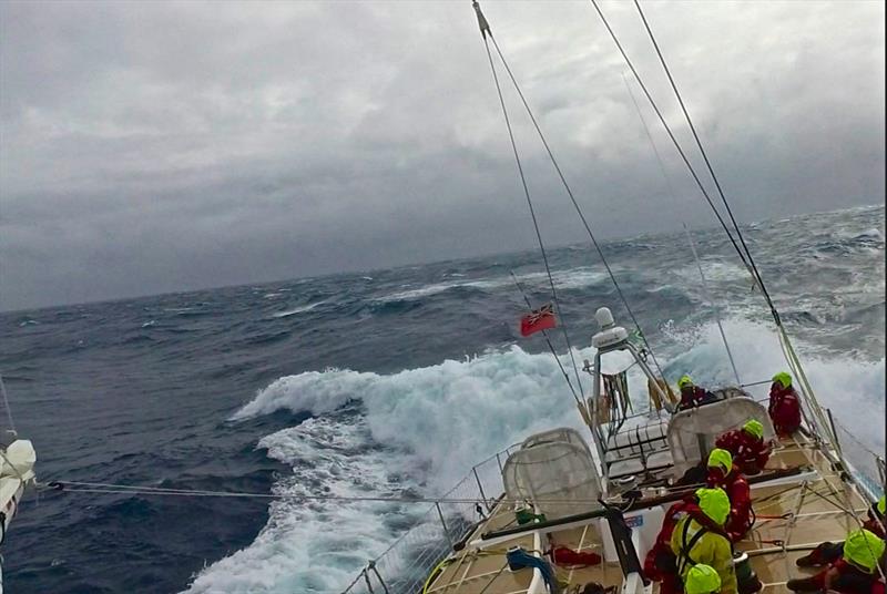 A competitor in the Clipper Round the World Yacht Race sailing in the Southern Ocean with the crew all tethered to the jackline photo copyright Clipper Race taken at  and featuring the Clipper 70 class