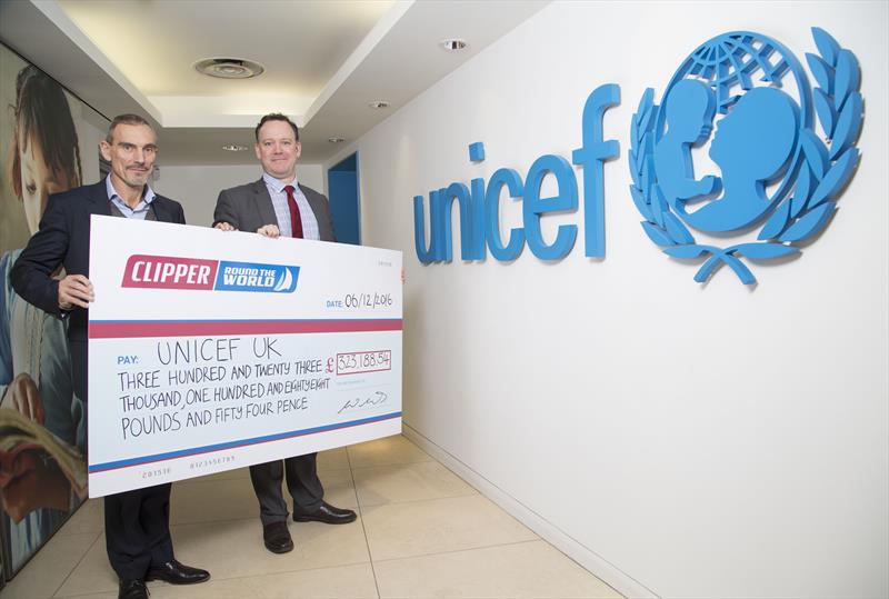 William Ward presending a cheque for £323,188.54 to Unicef UK photo copyright Clipper Ventures taken at  and featuring the Clipper Ventures class
