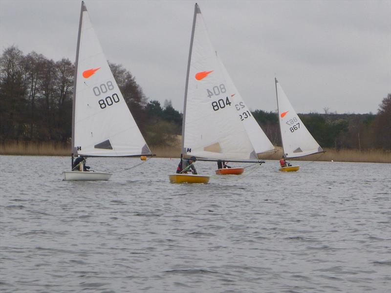 Solos and Comets at Frensham Pond photo copyright Clive Eplett taken at Frensham Pond Sailing Club and featuring the Comet class