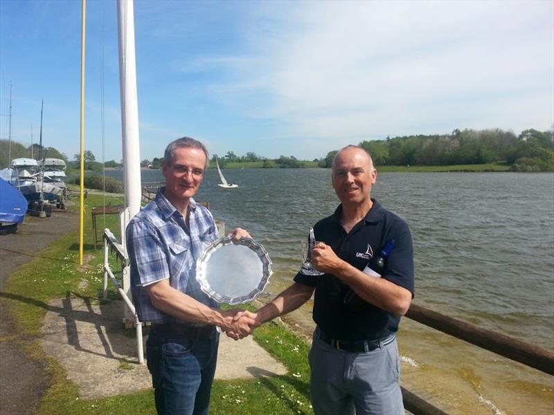 Winner Chris Jones presented trophy by club Commodore, Andy Roxburgh at the Comet Championship photo copyright Comet class taken at Sutton Bingham Sailing Club and featuring the Comet class
