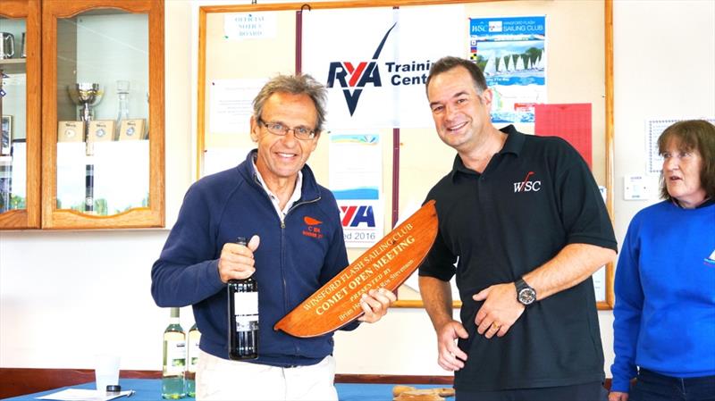Eddie Pope collects his prize from the Winsford Flash Commodore Ian Foulkes at the Comet Open prize giving photo copyright WFSC taken at Winsford Flash Sailing Club and featuring the Comet class