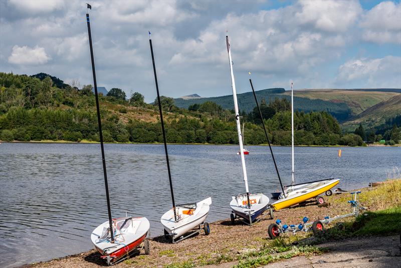 Boats with Pen-y-Fan in the background during the Merthyr Tydfil Comet Open photo copyright Alan Cridge taken at Merthyr Tydfil Sailing Club and featuring the Comet class
