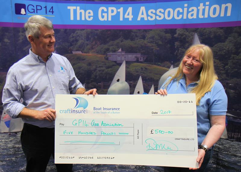 Mark Lee presenting the GP14 class with a cheque at the RYA Suzuki Dinghy Show photo copyright Mark Jardine / YachtsandYachting.com taken at RYA Dinghy Show and featuring the  class