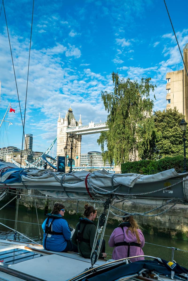 Sailing out of St Katherine's Dock at the start of leg 10 with the iconic Tower Bridge behind photo copyright Ellen MacArthur Cancer Trust taken at  and featuring the Cruising Yacht class
