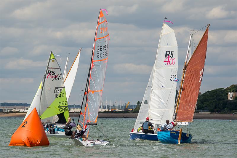Dinghy fleets at a turning mark during Mersea Week 2015 photo copyright Patricia Forrest taken at West Mersea Yacht Club and featuring the Dinghy class