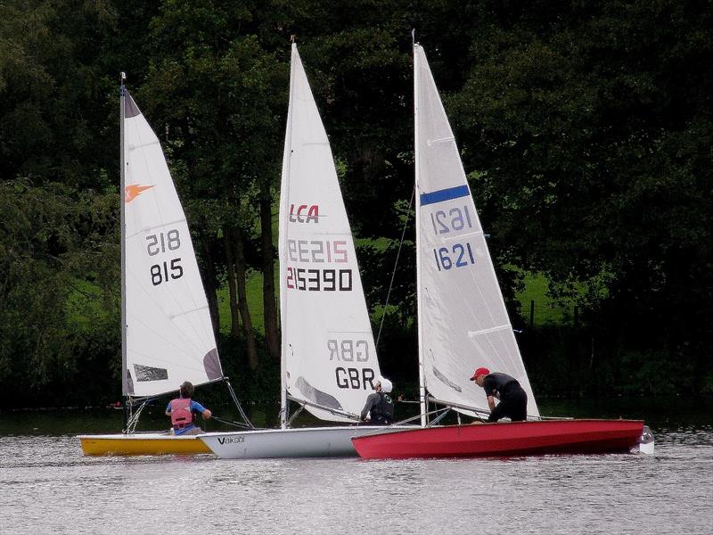 1st 2nd and 3rd nicely lined up during the 2023 Border Counties Midweek Sailing Series at Redesmere photo copyright John Nield taken at Redesmere Sailing Club and featuring the Dinghy class