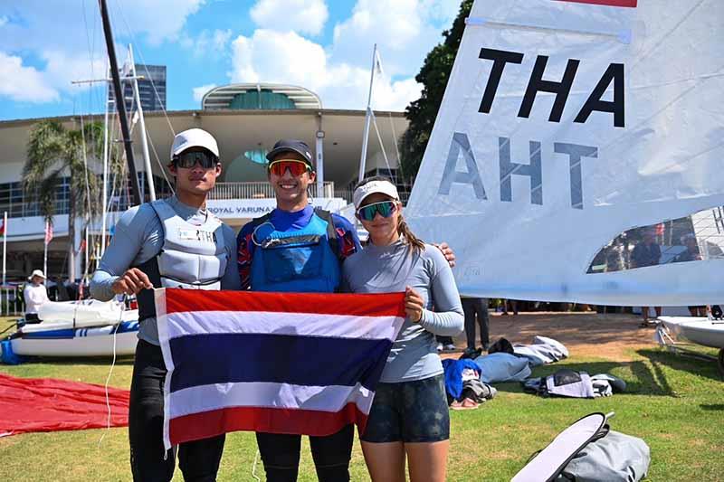 2023 Asian Sailing Championships - Thai ILCA sailors Chusitt Punjamala, Arthit Mikhail Romanyk, and Sophia Montgomery celebrate the country's qualification for Paris 2024 in the ILCA 7 and ILCA 6 classes photo copyright YRAT taken at Royal Varuna Yacht Club and featuring the Dinghy class