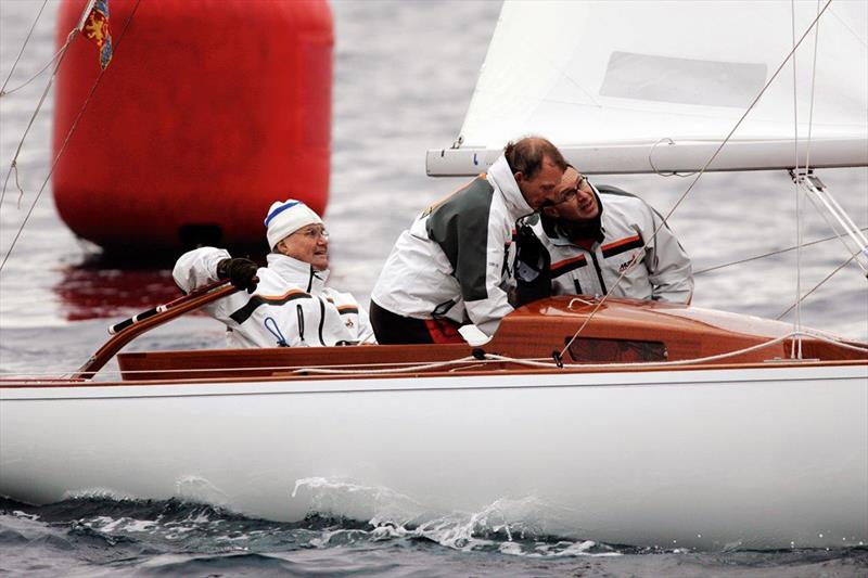 HRH Prince Henrik at the helm of one of his six Dragons - photo © RDYC