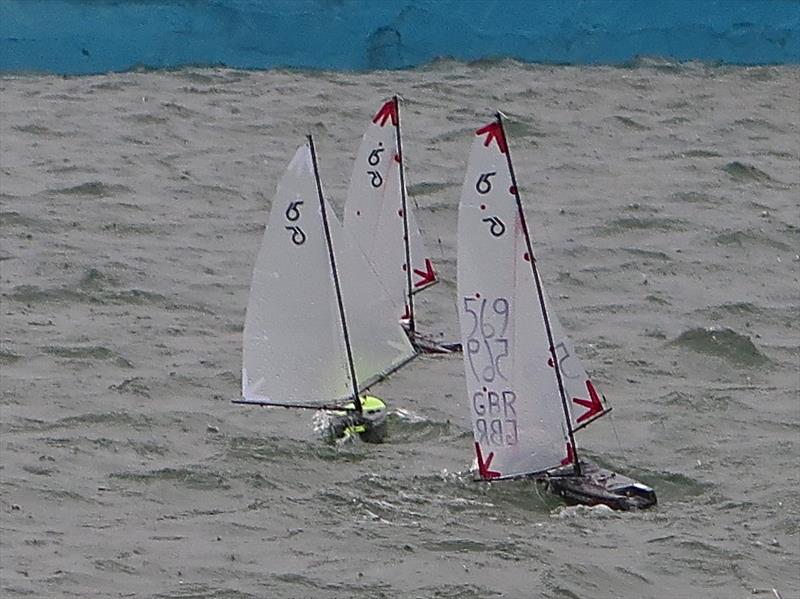 Keith Willis, Jon Harvey and Liam Willis racing downwind during the LTSC Radio Controlled Dragon Force 65 Championship photo copyright LPB Aerial Imagery / www.lpbaerial.com taken at Lymington Town Sailing Club and featuring the  class