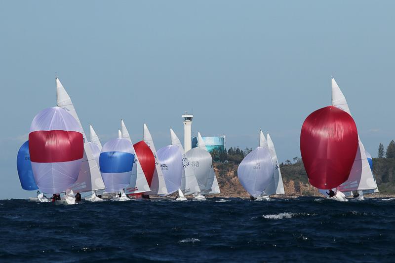 Magpie (Red and white spinnaker) bring the fleet back down to the leeward mark on day 1 of the Line 7 Etchells Australasian Championship at Mooloolaba - photo © Alex McKinnon Photography