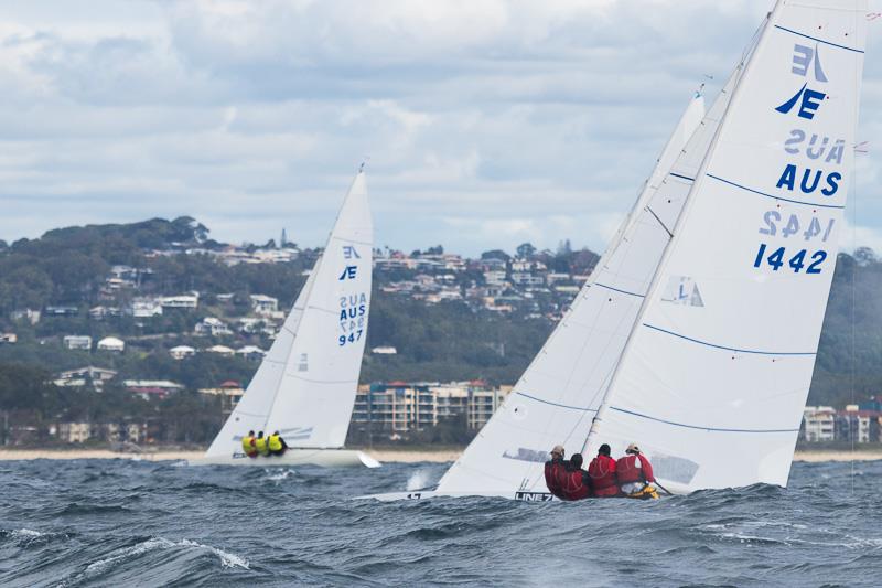 The yellow jerseys of Magpie in against the beach, with Iron Lotus in behind one of the many waves on offer on day 2 of the Line 7 Etchells Australasian Championship at Mooloolaba - photo © Alex McKinnon Photography