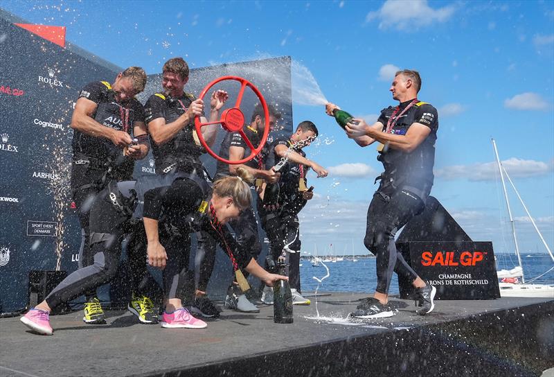 Australia SailGP Team spray champagne as they celebrate their win at ROCKWOOL Denmark Sail Grand Prix photo copyright Ian Roman for SailGP taken at Sailing Aarhus and featuring the F50 class