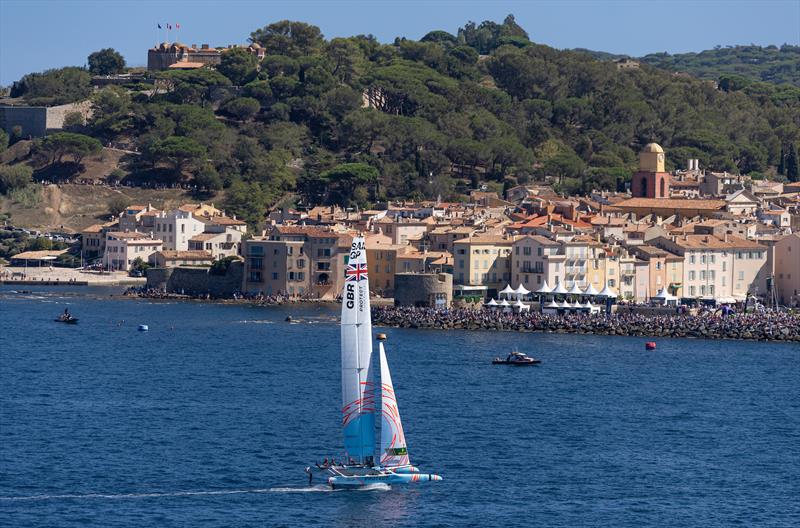 Great Britain SailGP Team  sail past the Old Town and Bell Tower of Saint Tropez on Race Day 2 of the Range Rover France Sail Grand Prix in Saint Tropez photo copyright David Gray/SailGP taken at Société Nautique de Saint-Tropez and featuring the F50 class