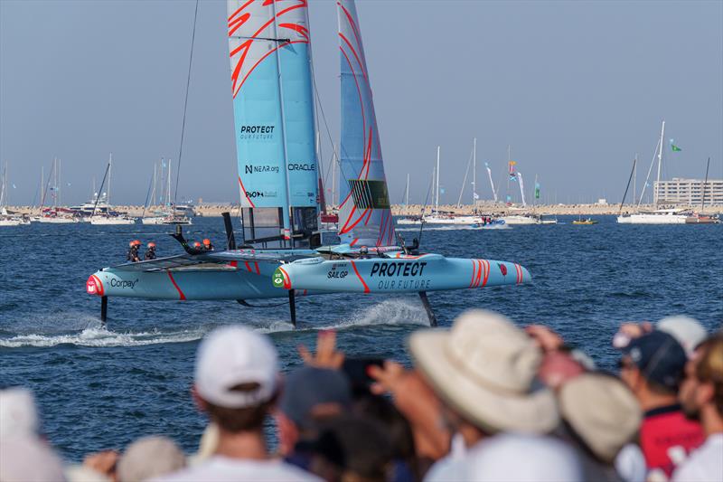 Great Britain SailGP Team helmed by Ben Ainslie in action as spectators watch on from the Race Village on Race Day 1 of the Dubai Sail Grand Prix presented by P&O Marinas in Dubai, United Arab Emirates photo copyright Joe Toth for SailGP taken at  and featuring the F50 class