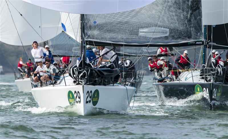Transfusion (AUS) and Kokomo (AUS) crew concentrate on the light conditions on day 1 of the Rolex Farr 40 Worlds photo copyright Rolex / Daniel Forster taken at St. Francis Yacht Club and featuring the Farr 40 class